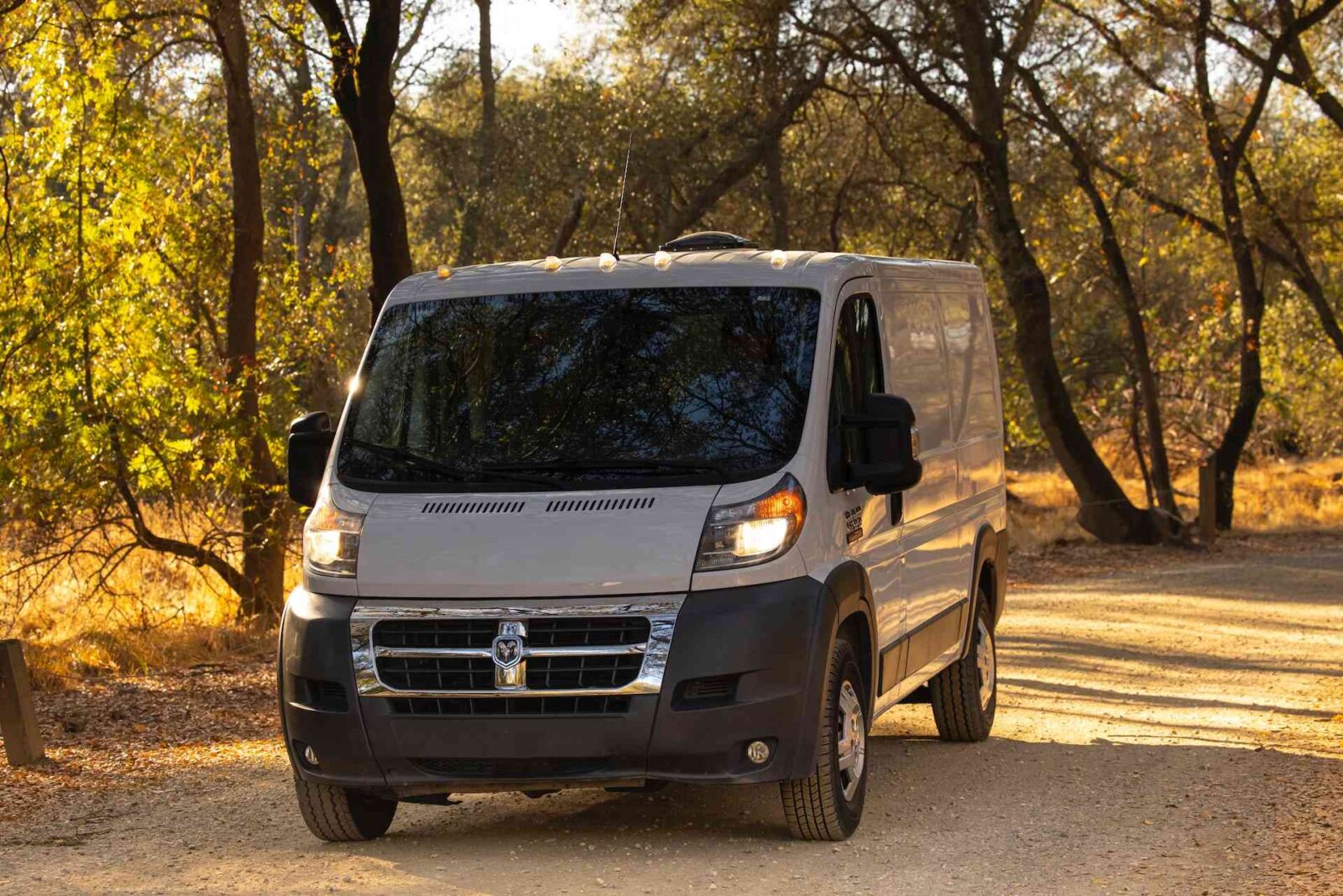A White Van on a country road.