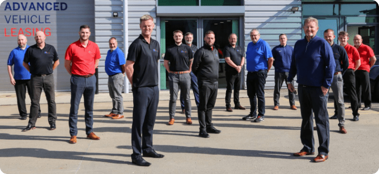 AVL Team Stood in Front of the Office